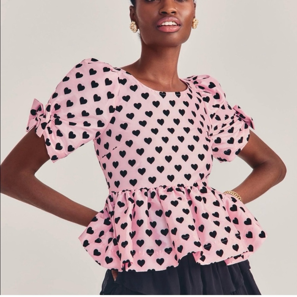 Pink top with velvet hearts and bows on sleeves. Beautiful and feminine.